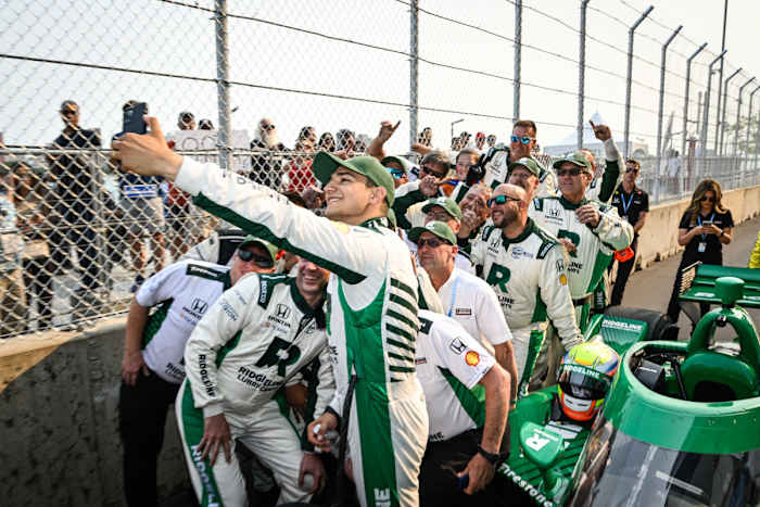 Alex Palou and his team stop to take a selfie after winning Sunday's Detroit Grand Prix. Photo courtesy Honda Racing.
